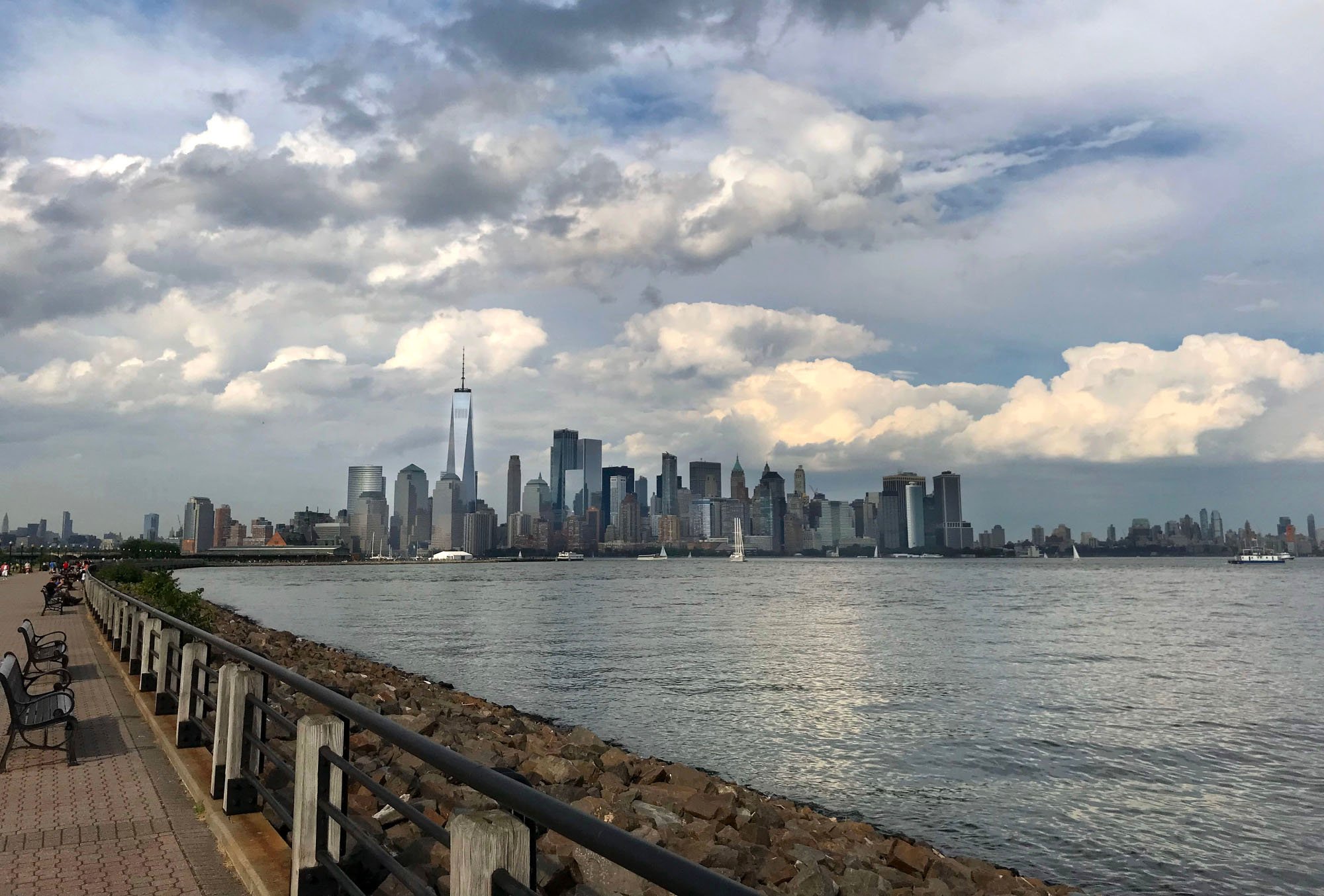 new jersey skyline as seen from liberty state park on a cloudy day